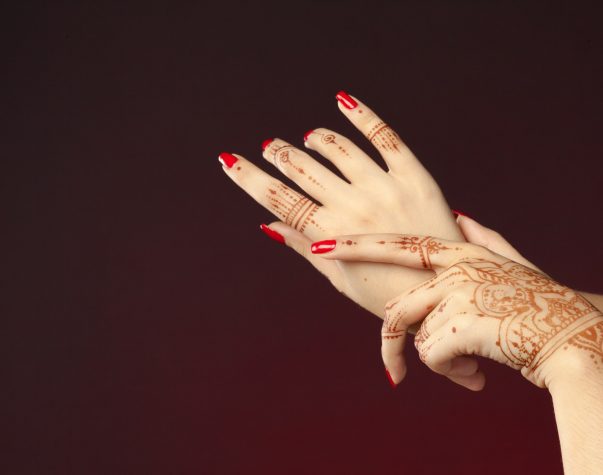 Woman Hands with mehndi